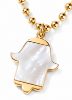 Close-up of the MOP Hamsa Necklace featuring a Hamsa pendant with mother of pearl-style inlay.