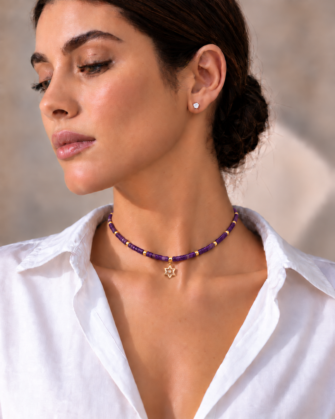 Model wearing Noa Star of David Beaded Choker Necklace in Amethyst.
