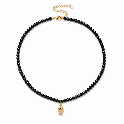 Adele Hamsa Beaded Necklace with black beads and gold tone Hamsa charm.