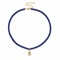 Adele Hamsa Beaded Necklace in Lapis with gold tone Hamsa charm.