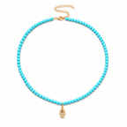 Adele Hamsa Beaded Necklace in Turquoise with gold tone Hamsa charm.