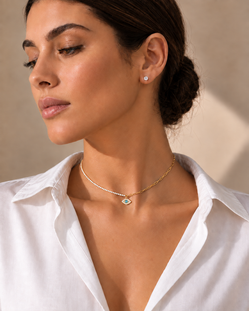 Model wearing the Adi Evil Eye Choker Necklace in Gold Tone.