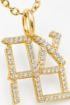 Close-up of the Ahava pendant with pavé-set Hebrew letters and a gold tone finish.