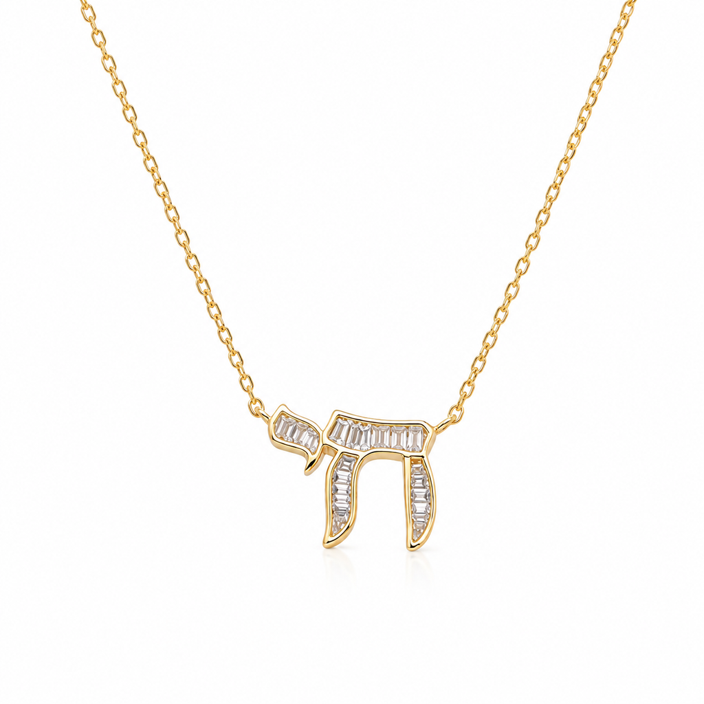 Gold tone Baguette Chai Necklace with baguette-cut stones on a white background.