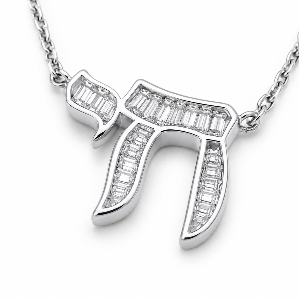 Close-up of the silver tone Baguette Chai pendant with cubic zirconia baguette stones.