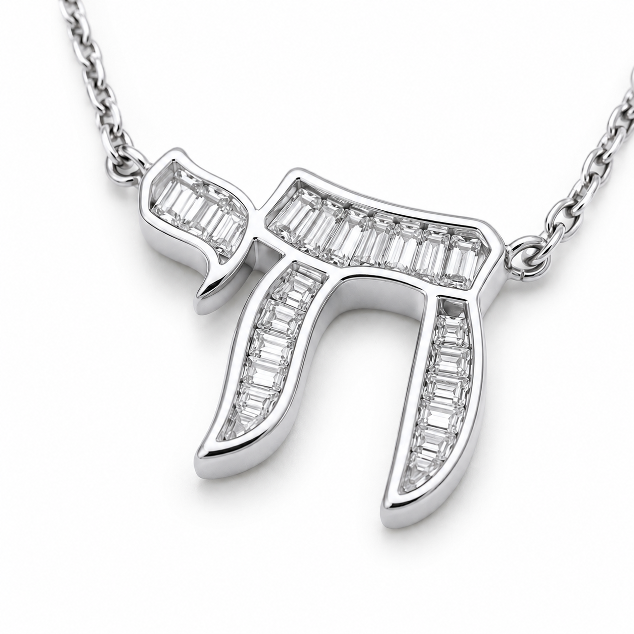 Close-up of the silver tone Baguette Chai pendant with cubic zirconia baguette stones.