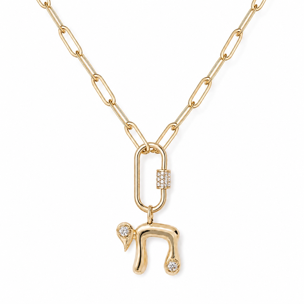 Gold tone Bubble Chai Lariat Necklace with pavé detailing on a white background.