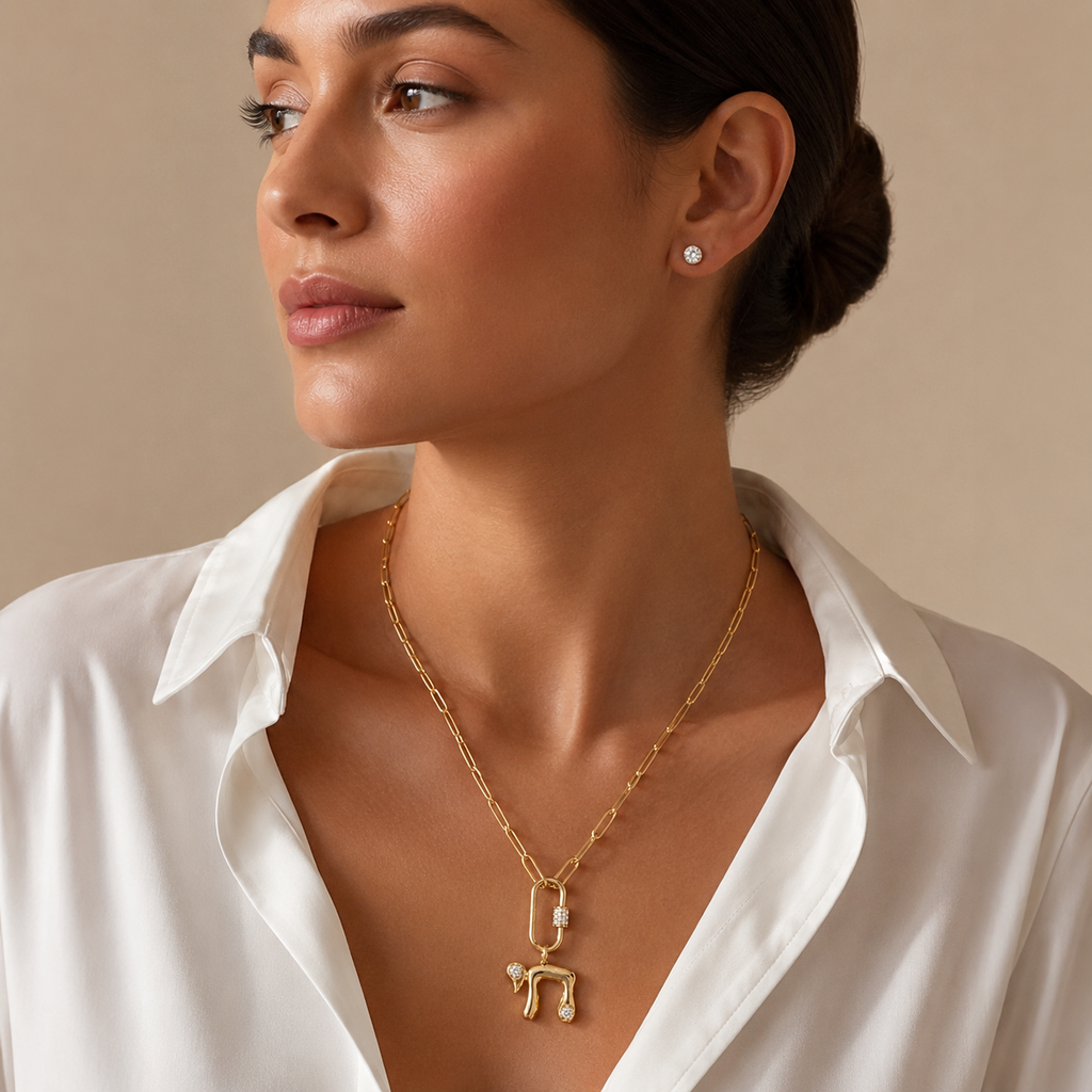 Model wearing the gold tone Bubble Chai Lariat Necklace.