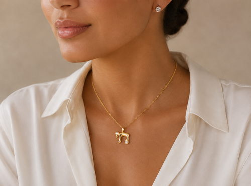 Woman wearing the Bubble Chai Necklace in Gold Tone.