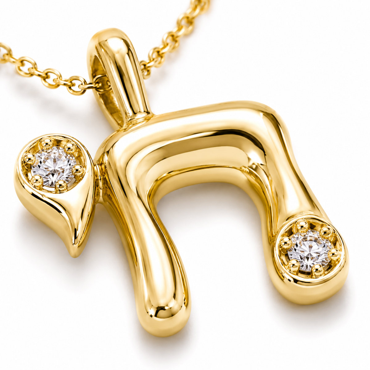 Close-up of the Bubble Chai Necklace pendant showing polished finish and cubic zirconia accents.