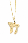 Gold tone Carved Chai Necklace with Star of David, Hamsa, Evil Eye, and fish symbols on a white background.