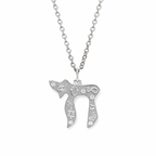 Silver tone Carved Chai Necklace with Star of David, Hamsa, Evil Eye, and fish symbols on a white background.