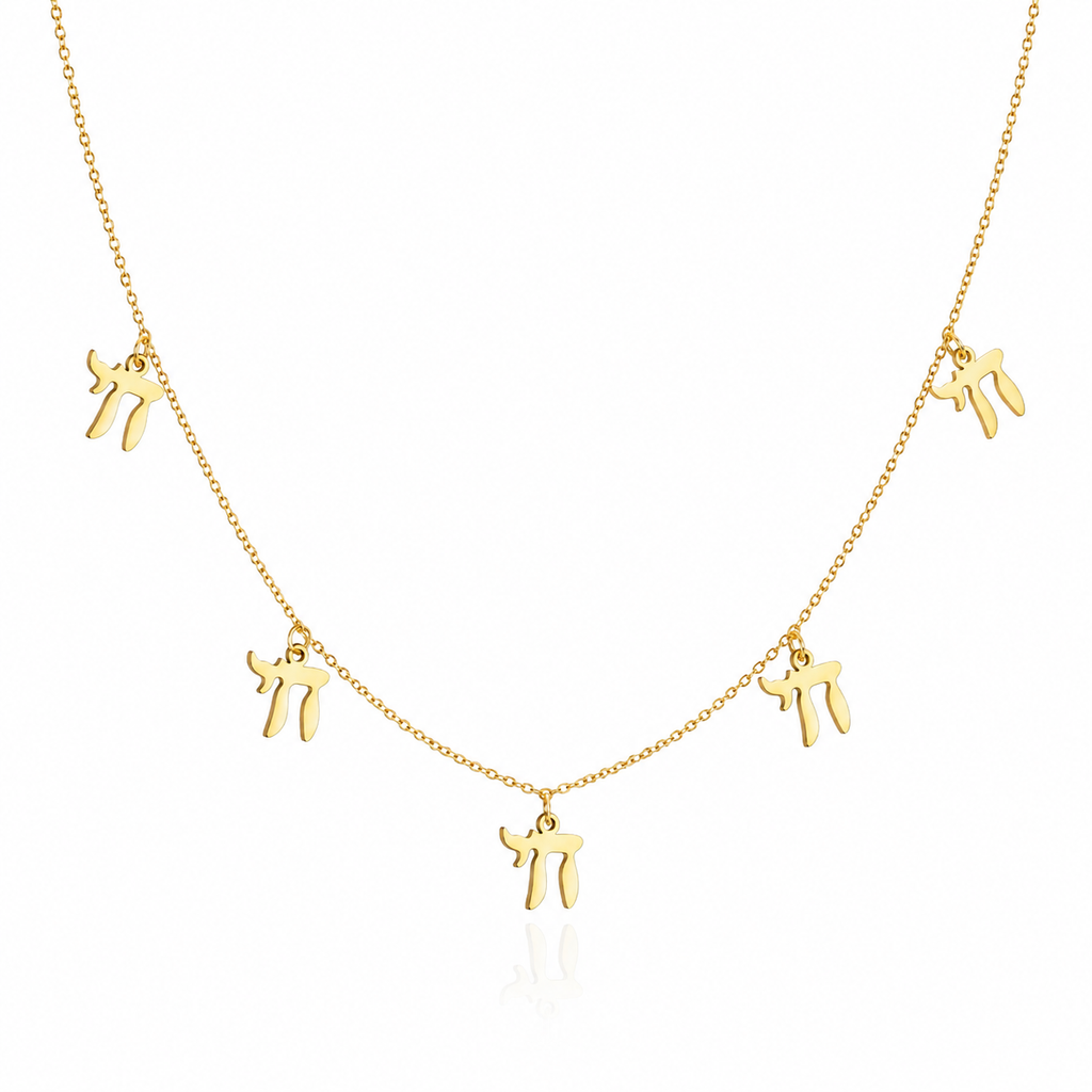 Gold tone “Chai on Life” Choker Necklace with five dangling Chai charms on a white background.