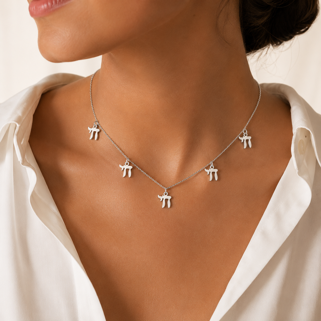 Model wearing the silver tone “Chai on Life” Choker Necklace.