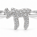 Close-up of silver tone Chai Pavé Ring with cubic zirconia stones