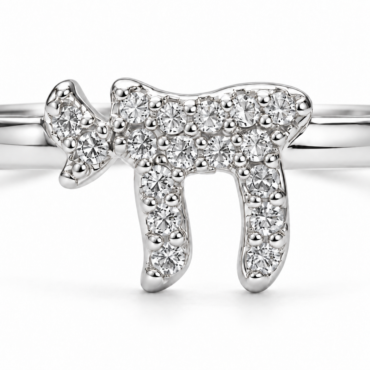 Close-up of silver tone Chai Pavé Ring with cubic zirconia stones