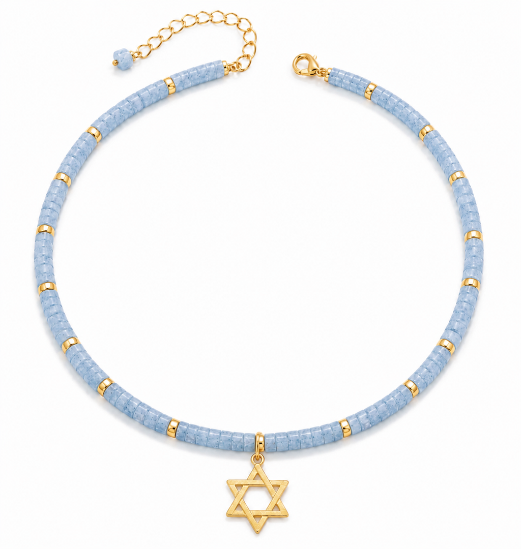 Blue quartz Dead Sea Magen David necklace with gold tone Star of David pendant on a white background.