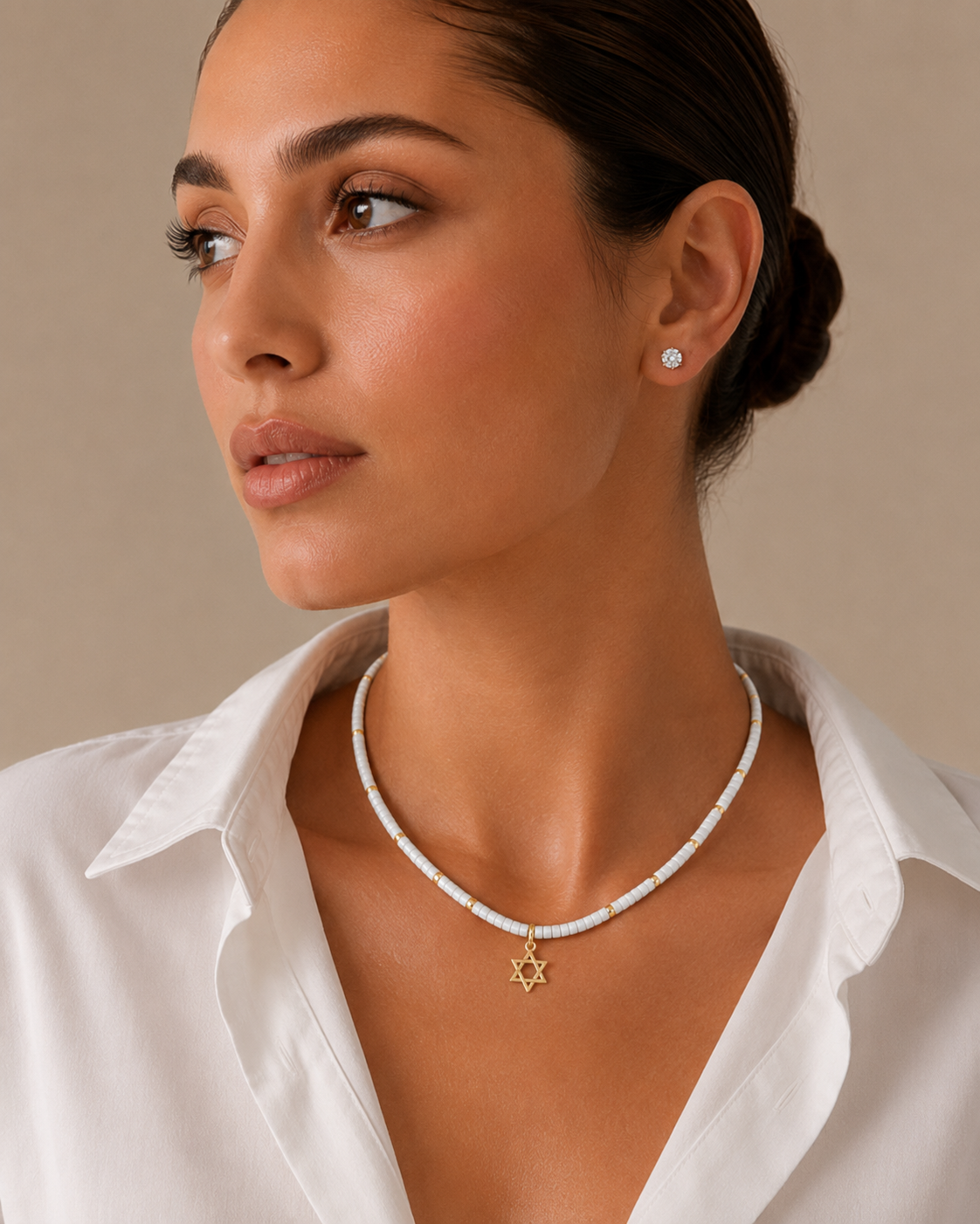 Model wearing the clear quartz Dead Sea Magen David necklace.
