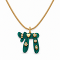 Green Lucky Chai Necklace with gold tone snake chain and symbolic charms on a white background.