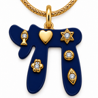 Close-up of the navy Chai pendant with a heart, fish, Star of David, Hamsa, evil eye, and round stone accent.