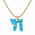 Turquoise Lucky Chai Necklace with gold tone snake chain and symbolic charms on a white background.