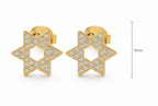Gold tone Magen David pavé stud earrings shown with size reference.