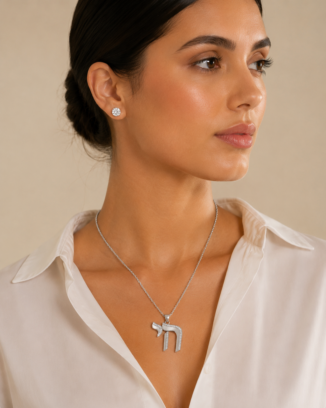 Model wearing the silver tone Outline Pavé Chai Necklace.