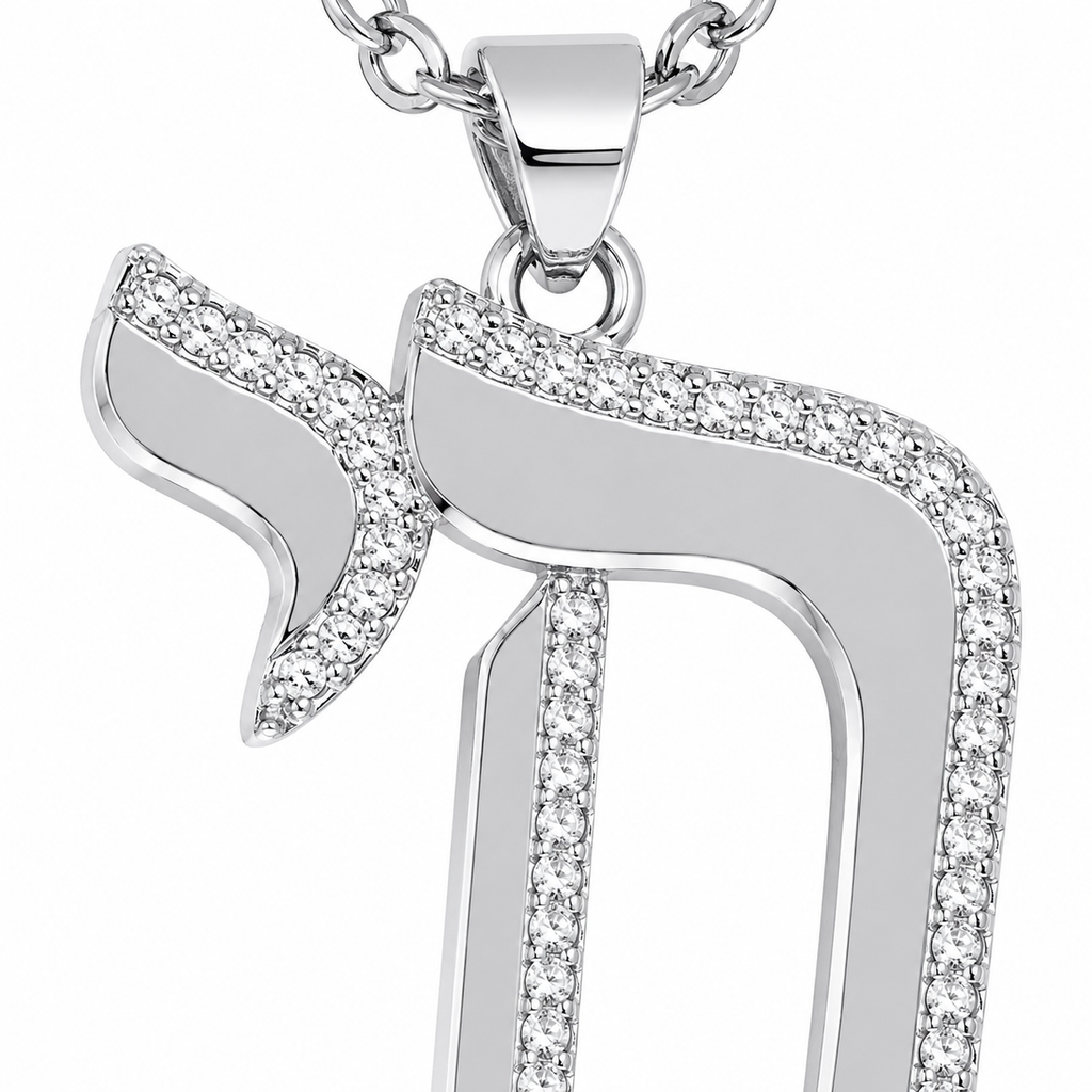 Close-up of the silver tone Outline Pavé Chai pendant with pavé-set stones.