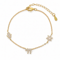 Gold Tone Pavé Trio Bracelet featuring Star of David, Hamsa, and Chai charms with pavé cubic zirconia on an adjustable cable link chain.