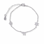 Silver Tone Pavé Trio Bracelet featuring Star of David, Hamsa, and Chai charms with pavé cubic zirconia on an adjustable cable link chain.