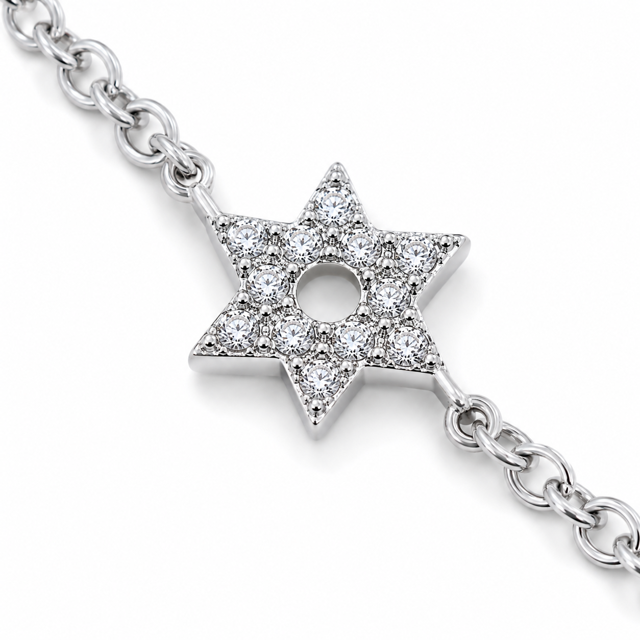 Close-up of the pavé cubic zirconia Star of David charm on the Silver Tone Pavé Trio Bracelet.