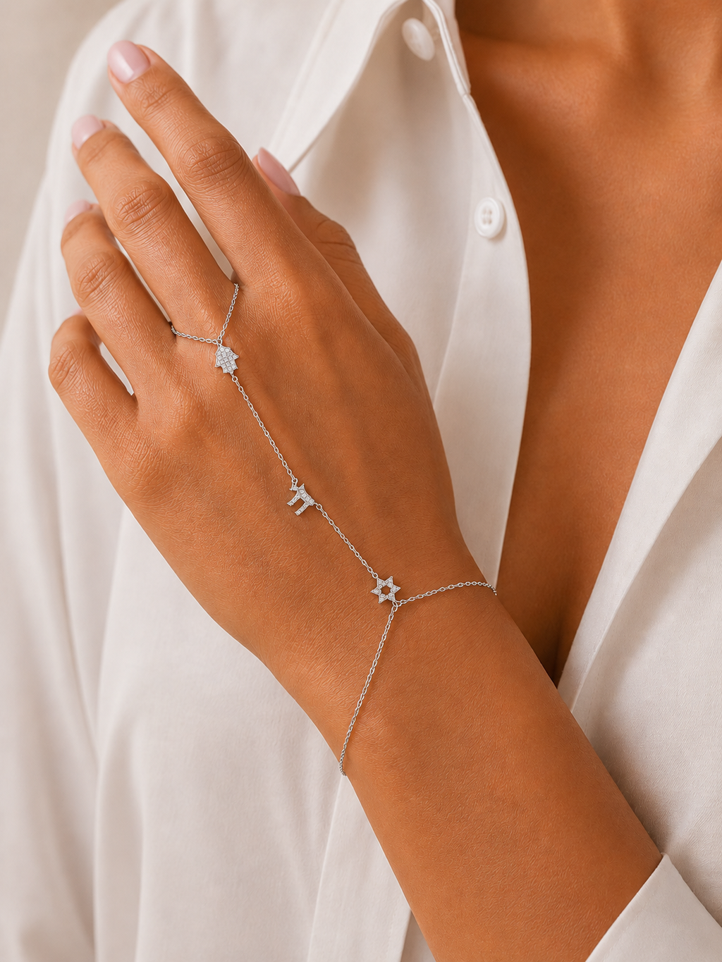 Model wearing the silver tone Pavé Trio Hand Chain.