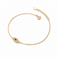 Gold tone Petite Evil Eye Bracelet with a blue center and sparkling stone accents on a white background.