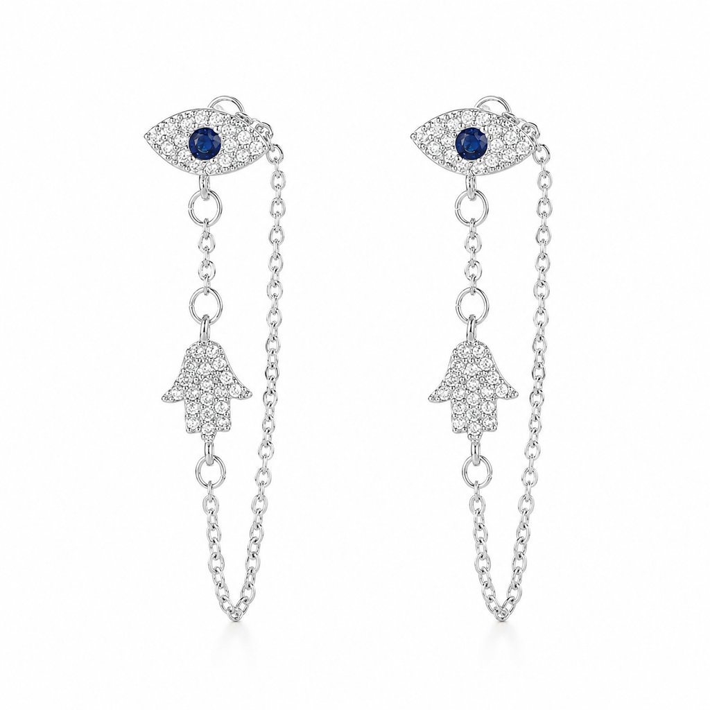 Silver Tone Protection Drop Chain Earrings featuring pavé Evil Eye studs with blue center stones connected to pavé Hamsa charms by delicate drop chains.