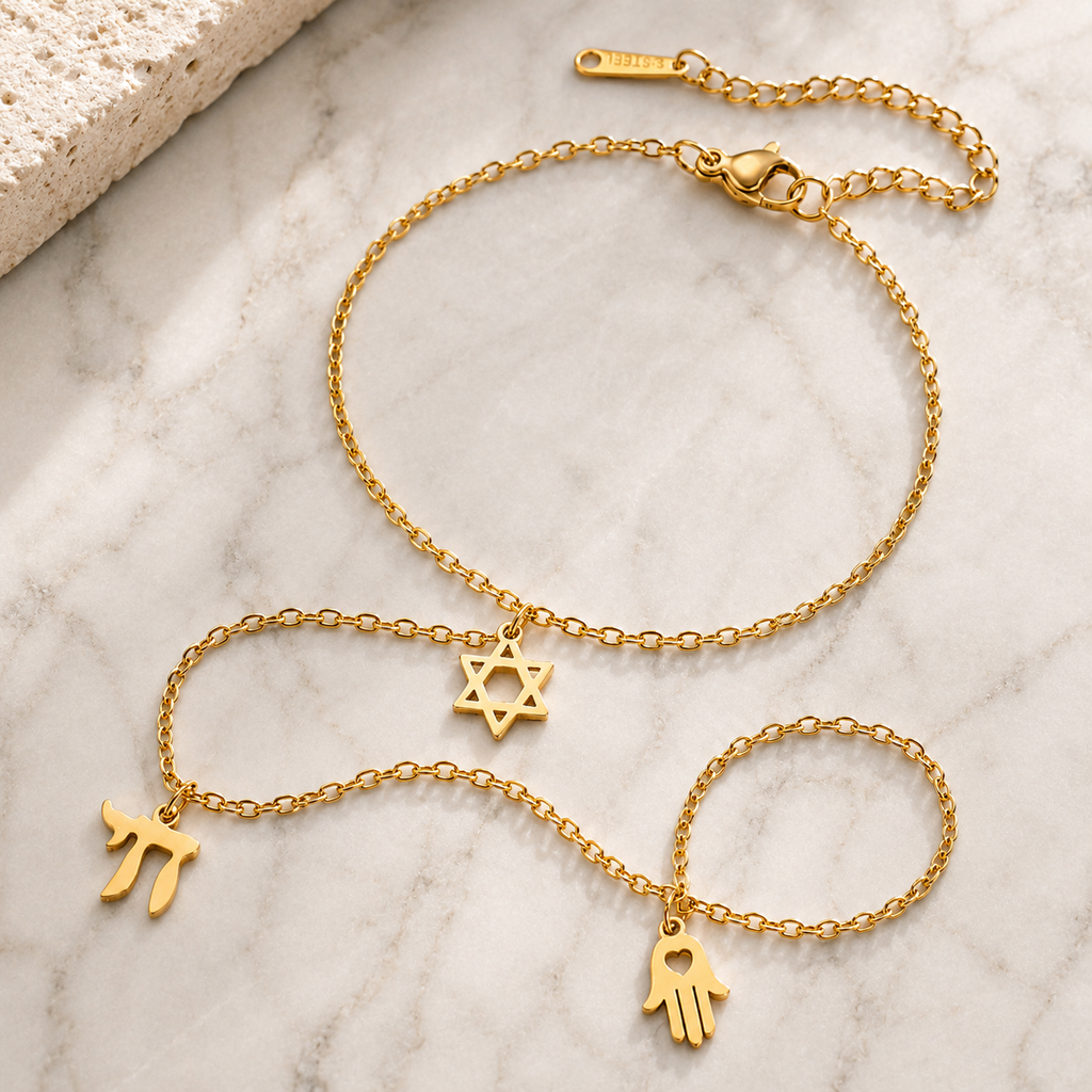 Gold tone Protection • Identity • Life Hand Chain styled on a neutral stone surface.