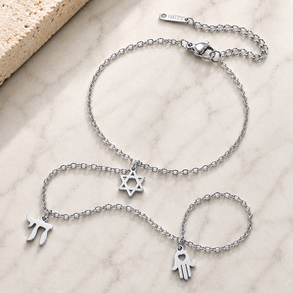 Silver tone Protection • Identity • Life Hand Chain styled on a neutral stone surface.
