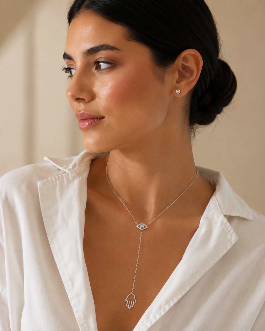 Model wearing the silver tone Protection Lariat Necklace.