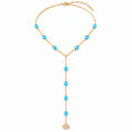 Blue See No Evil Lariat Necklace with a gold tone chain and pavé CZ evil eye charm on a white background.